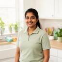 Kawalpreet Obadiaru, cleaning team lead, standing in a bright residential kitchen